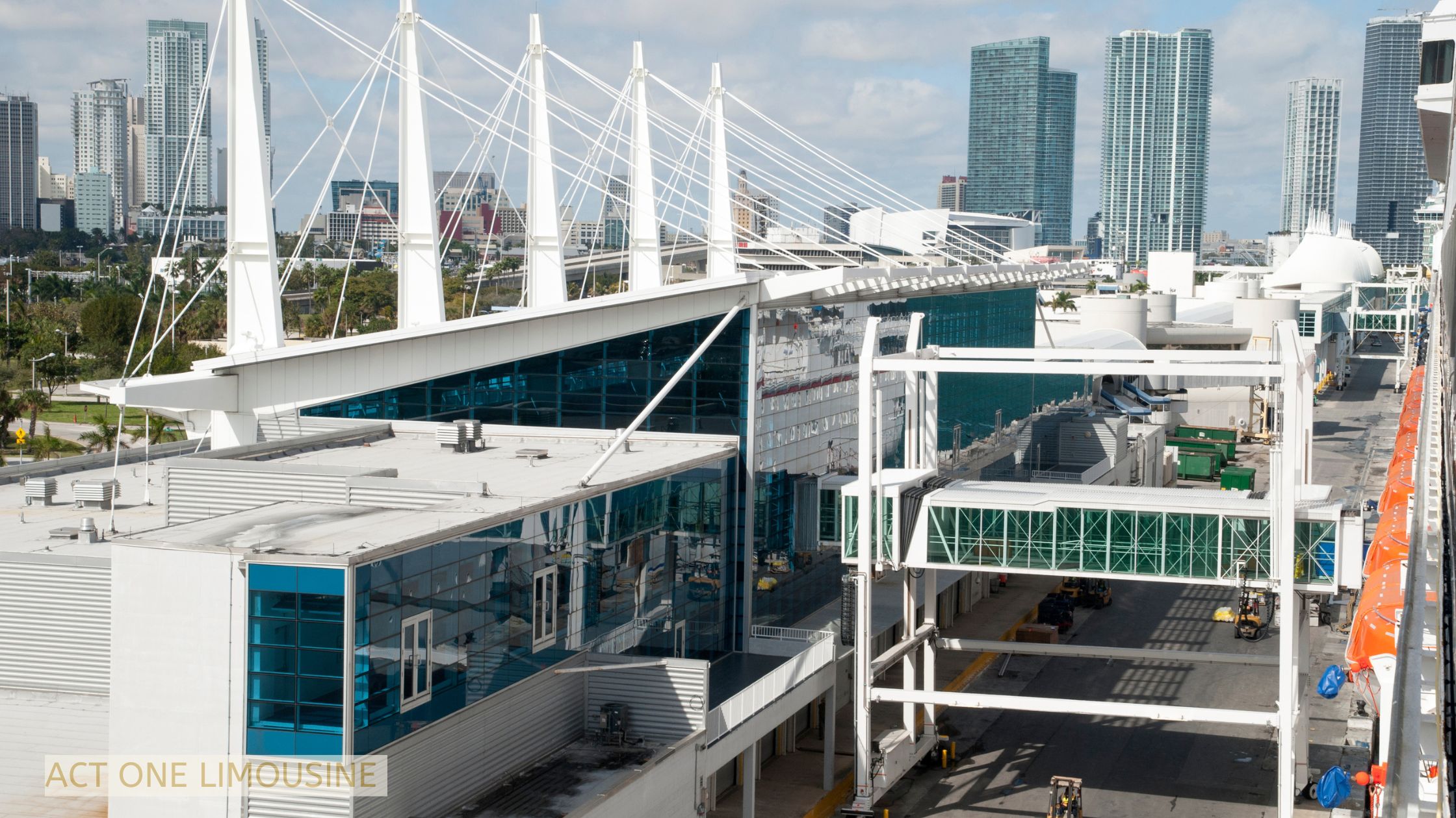 View of Miami Cruise Port with cruise ships docked and Miami skyline in the background